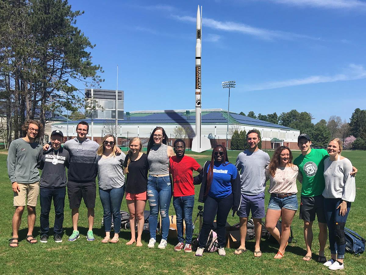 A group of physics student with rocket